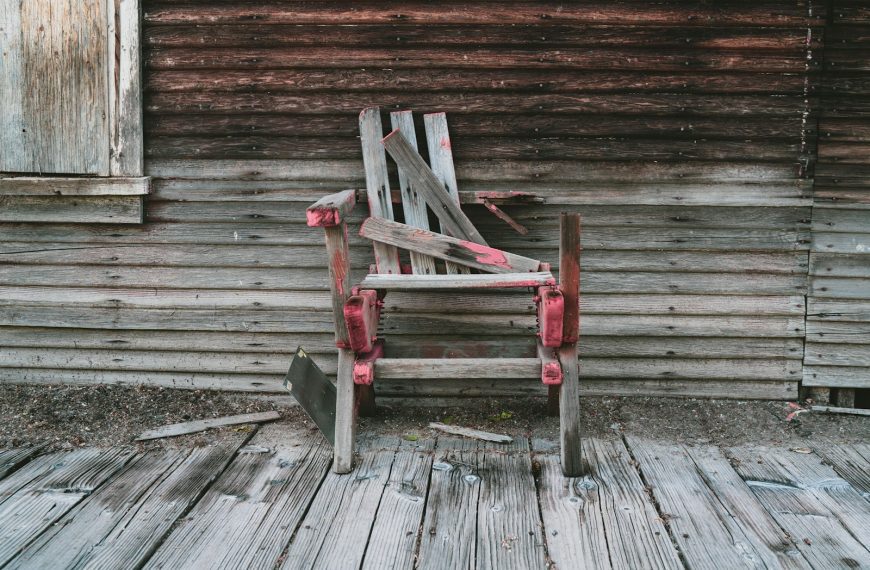 brown wooden broken furniture outside the shed
