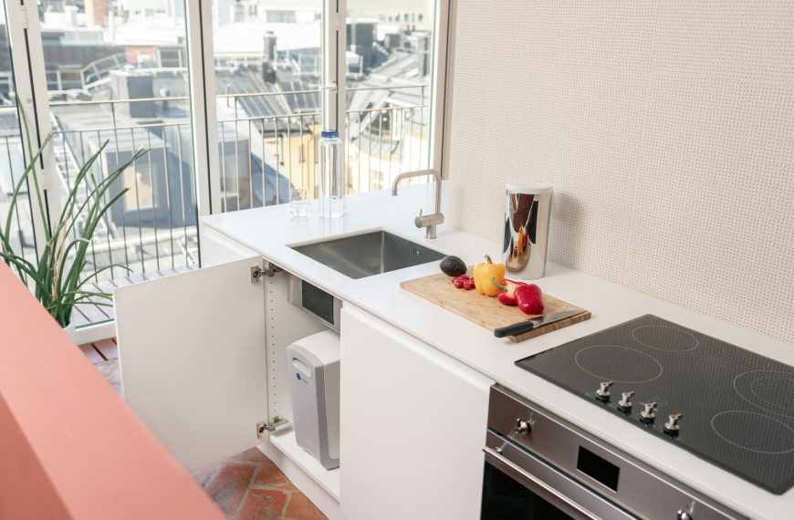 a kitchen with a sink and a window