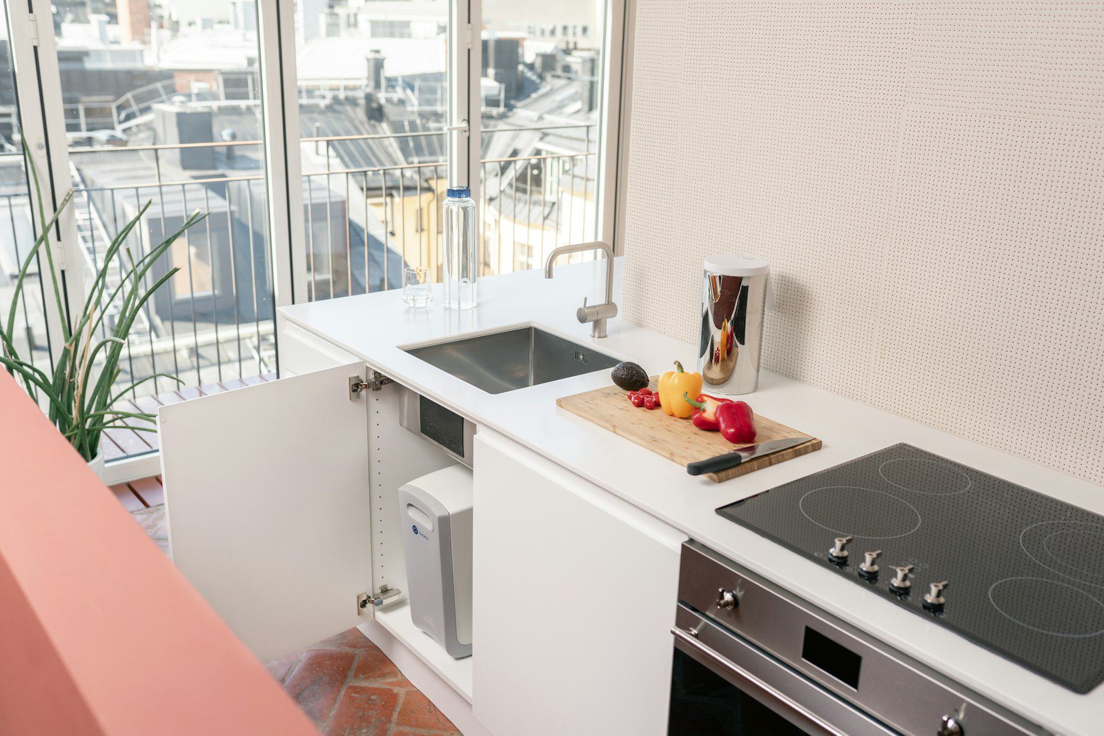 a kitchen with a sink and a window