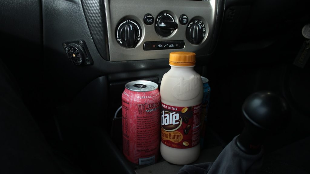 white and red plastic bottle