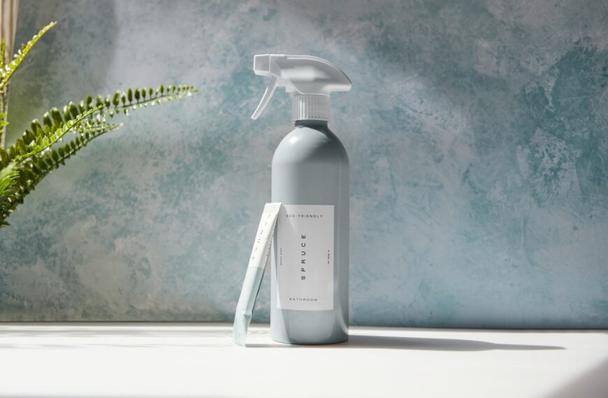 white plastic pump bottle on white table