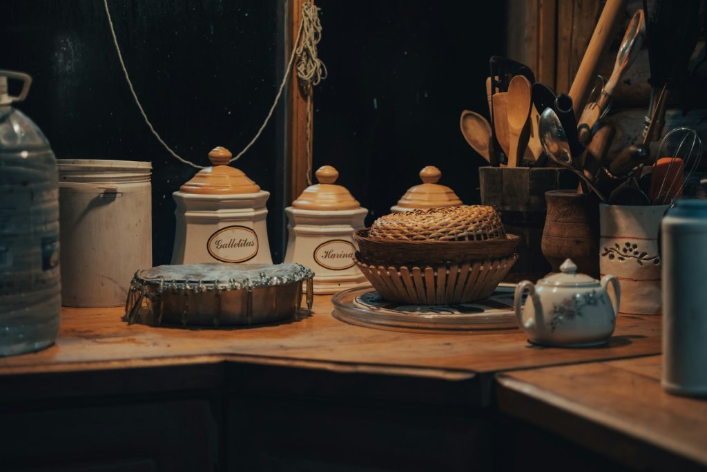 brown and white ceramic container on brown wooden table