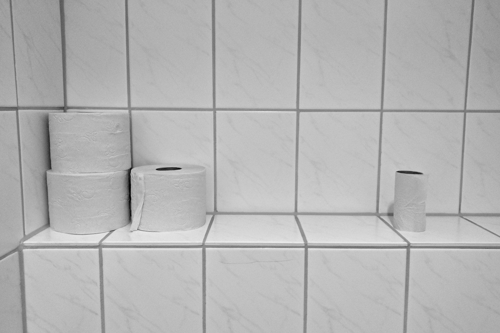 three toilet papers