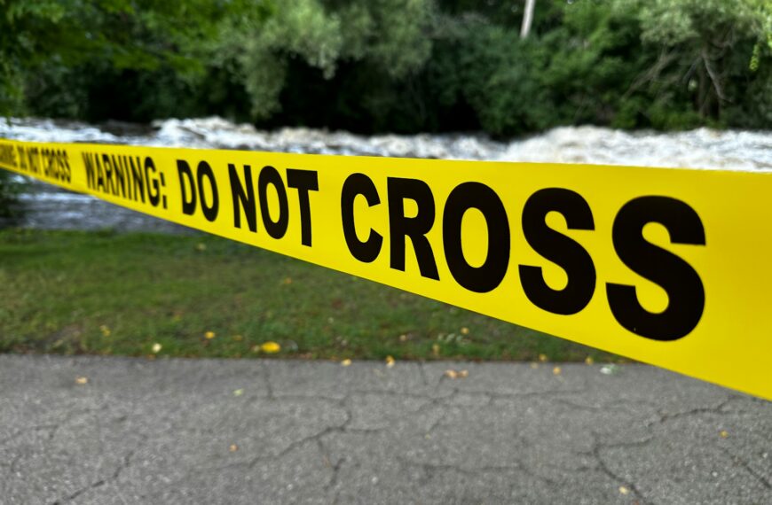 Yellow caution tape with "do not cross" text