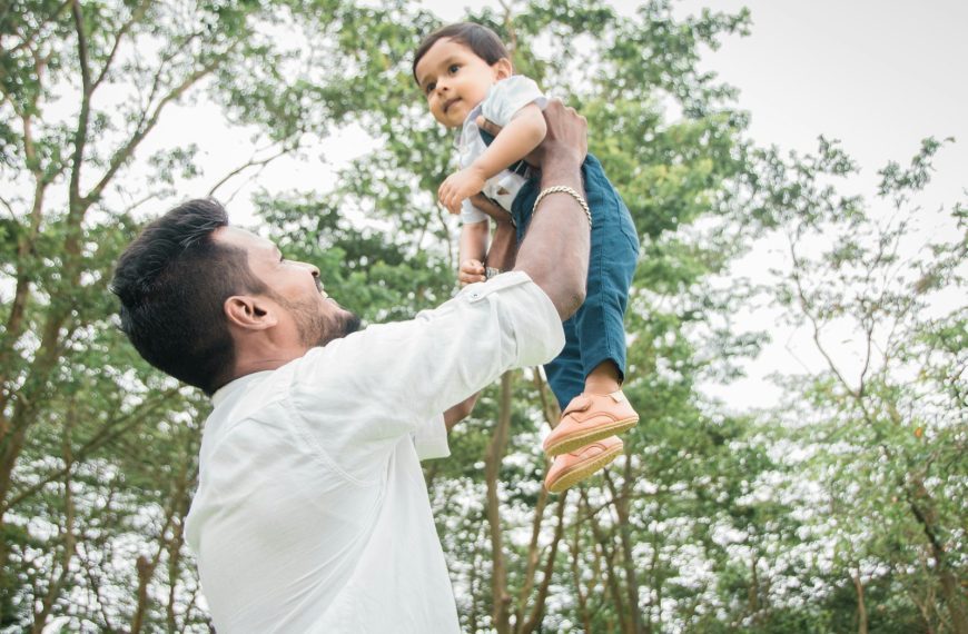a person holding a baby
