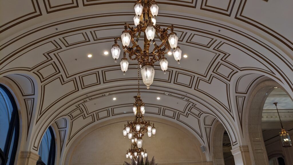 A chandelier hanging from the ceiling of a building
