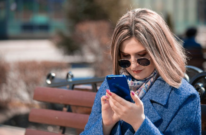 woman holding smartphone