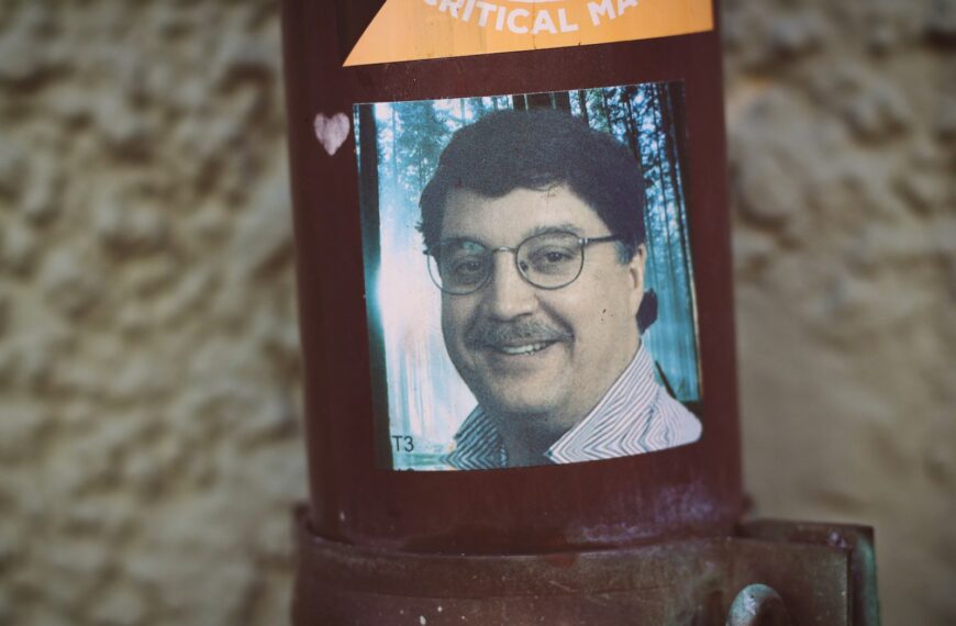 black and orange labeled bottle