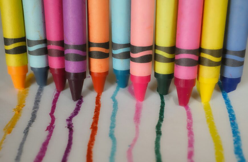 a group of crayons lined up in a row