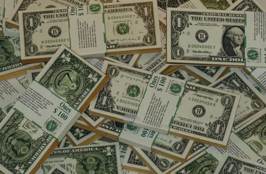 Numerous bundles of US one dollar bills symbolizing wealth, finance, and savings.