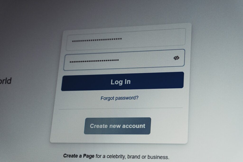 Facebook login screen with username and password fields.