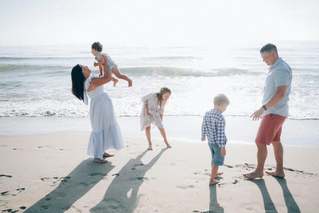 a family walking on the beach