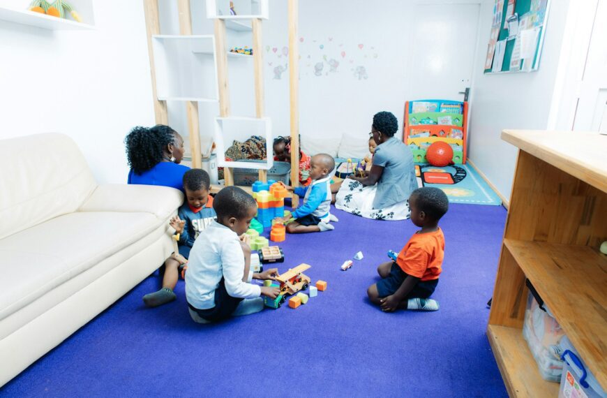 Children playing with toys in a bright room.