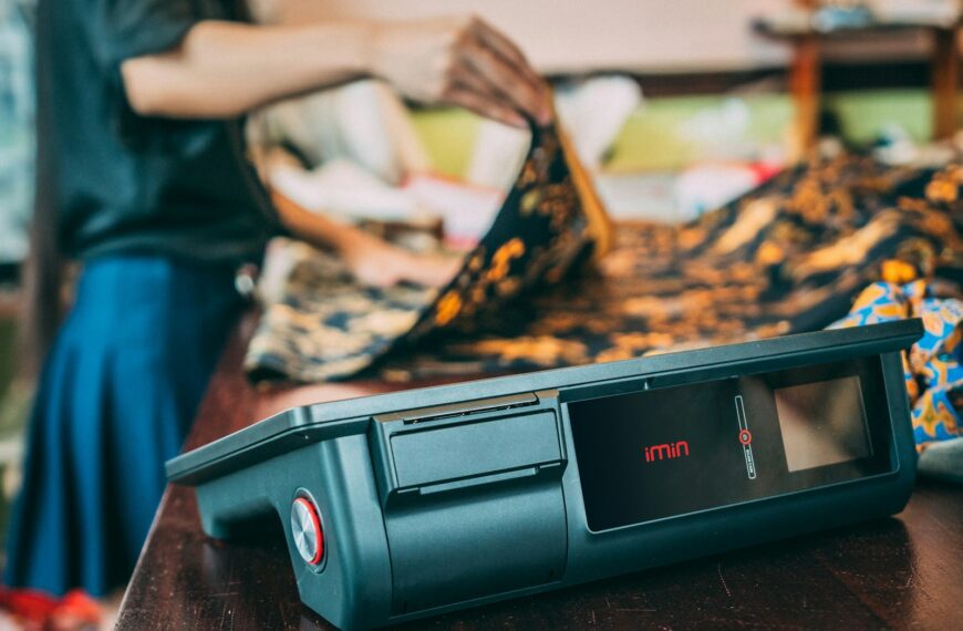 a person putting a fire in a microwave oven