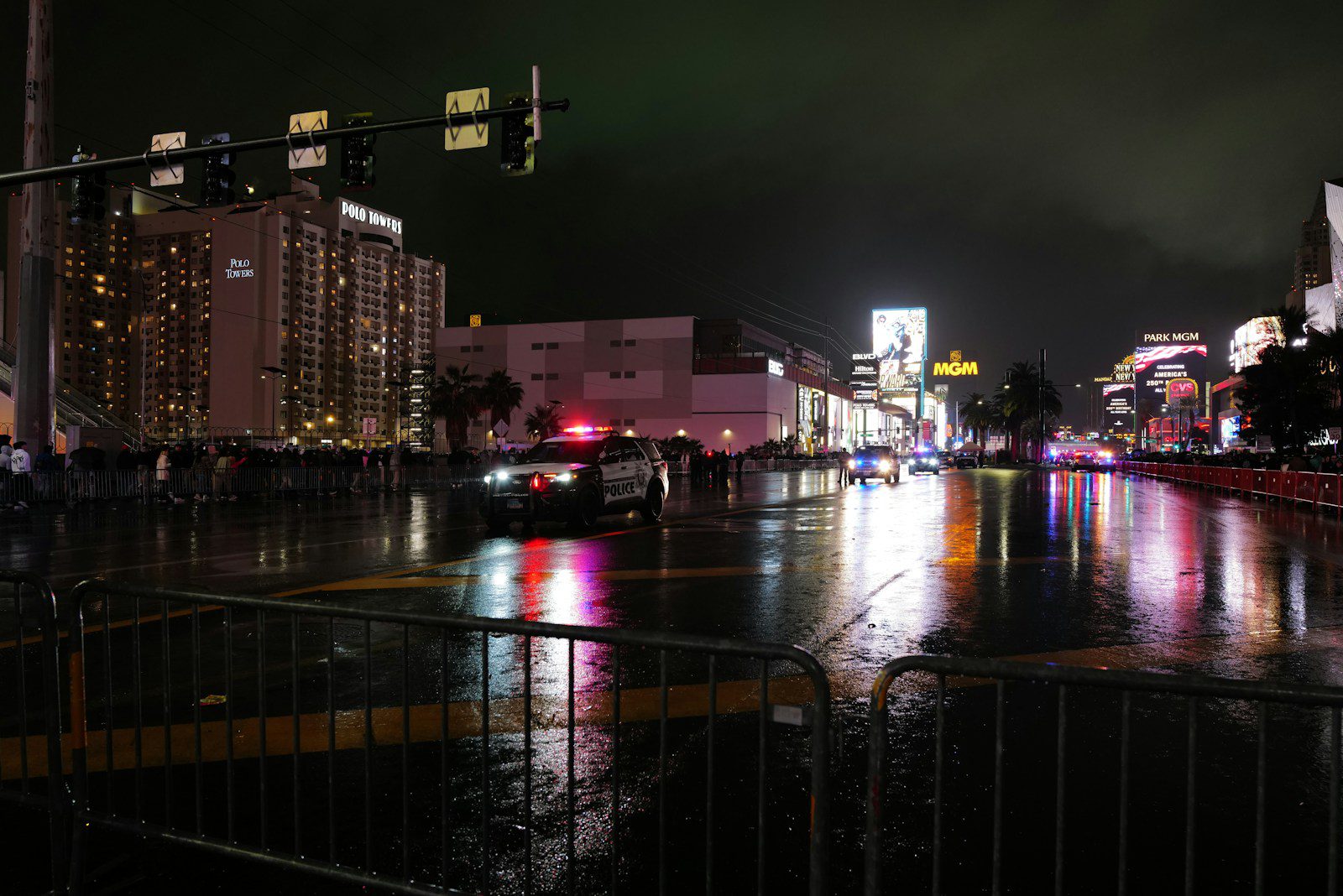 City street at night with wet reflections