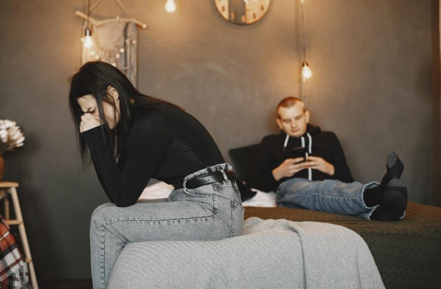 A couple experiencing tension and distance, highlighting relationship challenges.