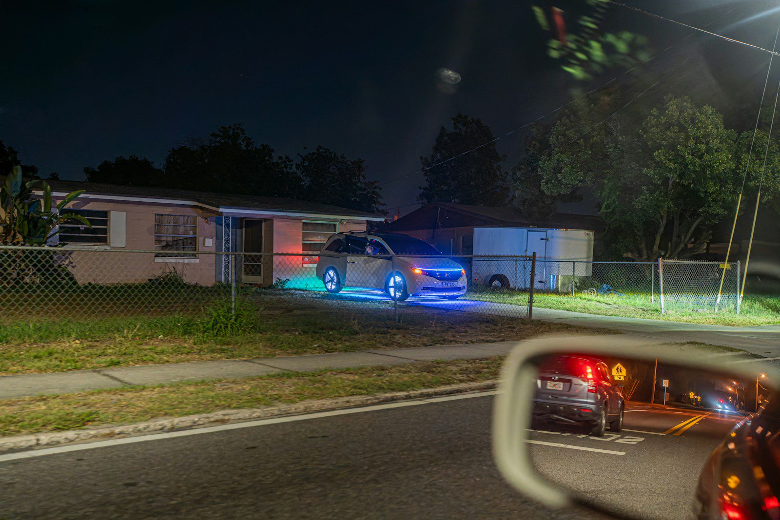a couple of cars that are sitting in the street