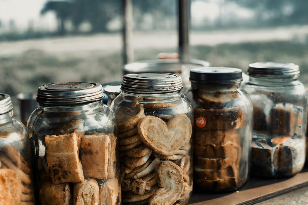 biscuits, heart biscuits, biscuits jar, glass jar, shop, rural india, rural life, traditional, traditional indian snacks, classic, vintage