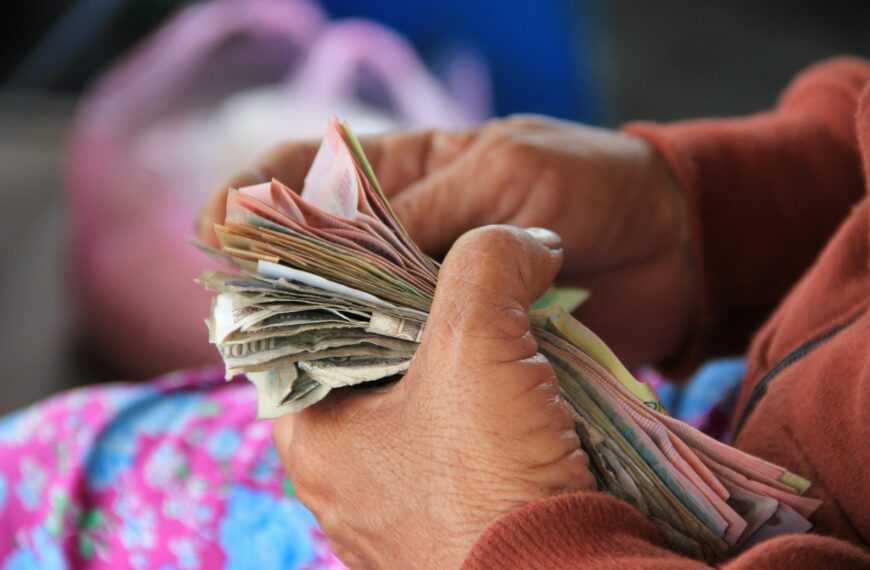 person holding banknotes