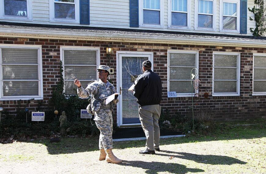 Police Say Toddler Was Found Standing on Bed Holding…