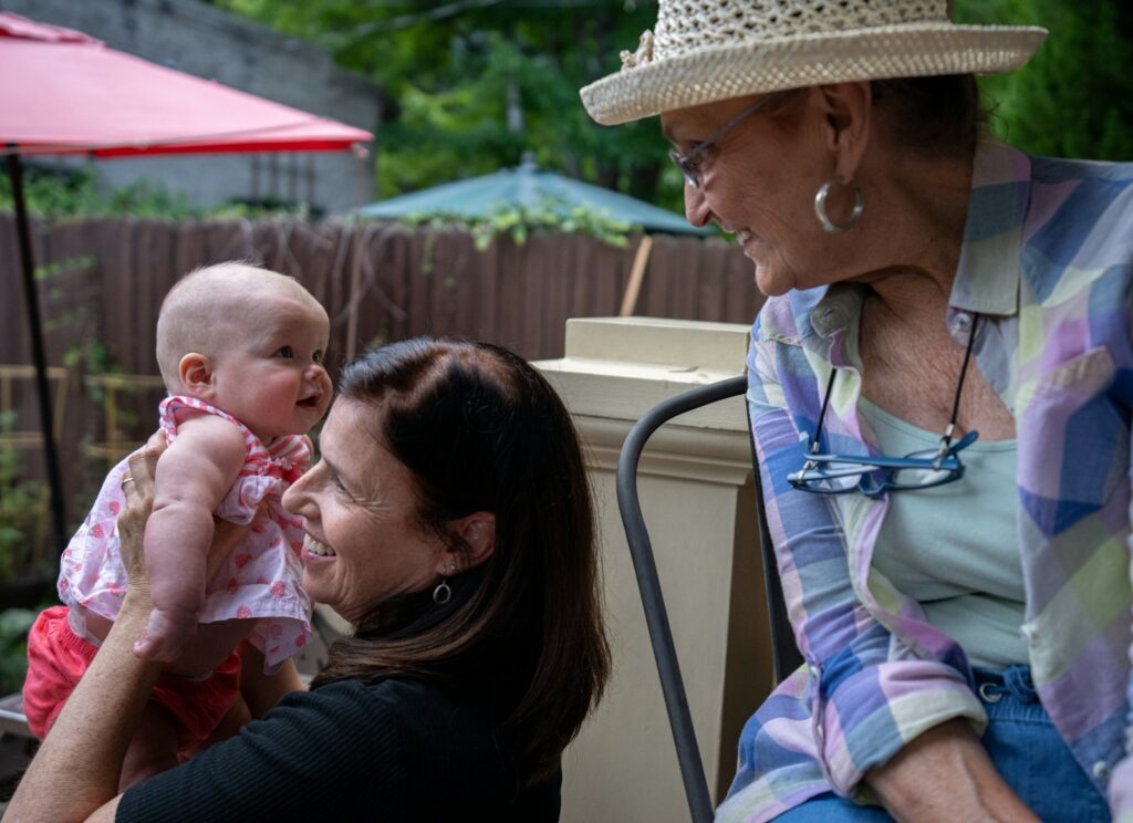 a man holding a baby