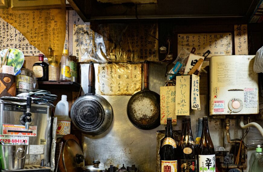 stainless steel cooking pot on brown wooden table