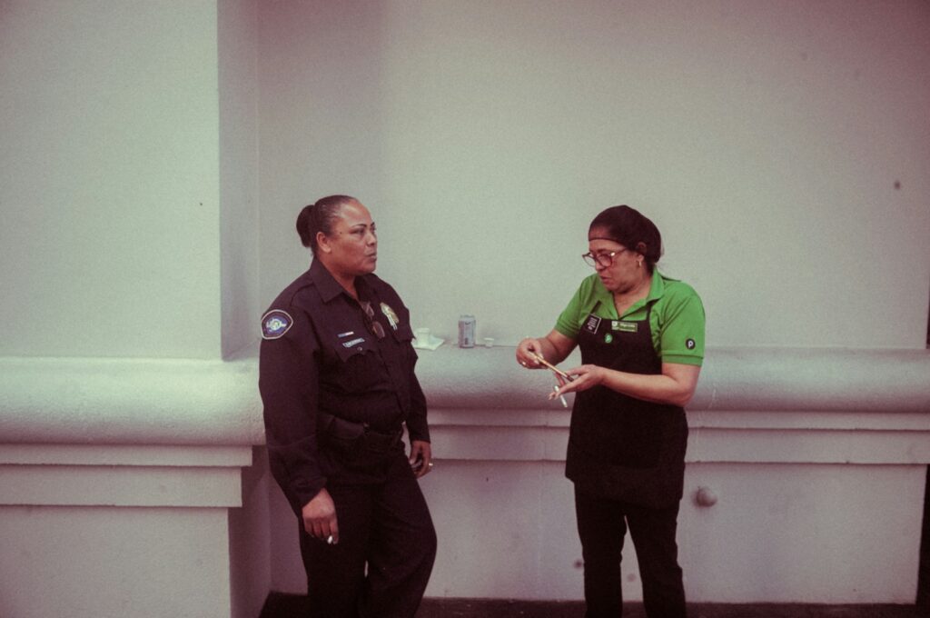 A man and a woman standing next to each other