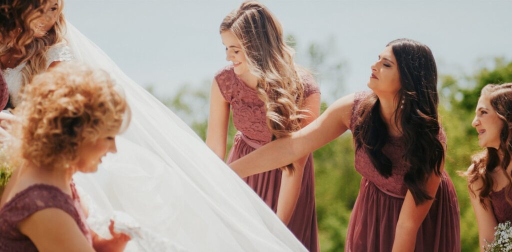 a group of women standing next to each other