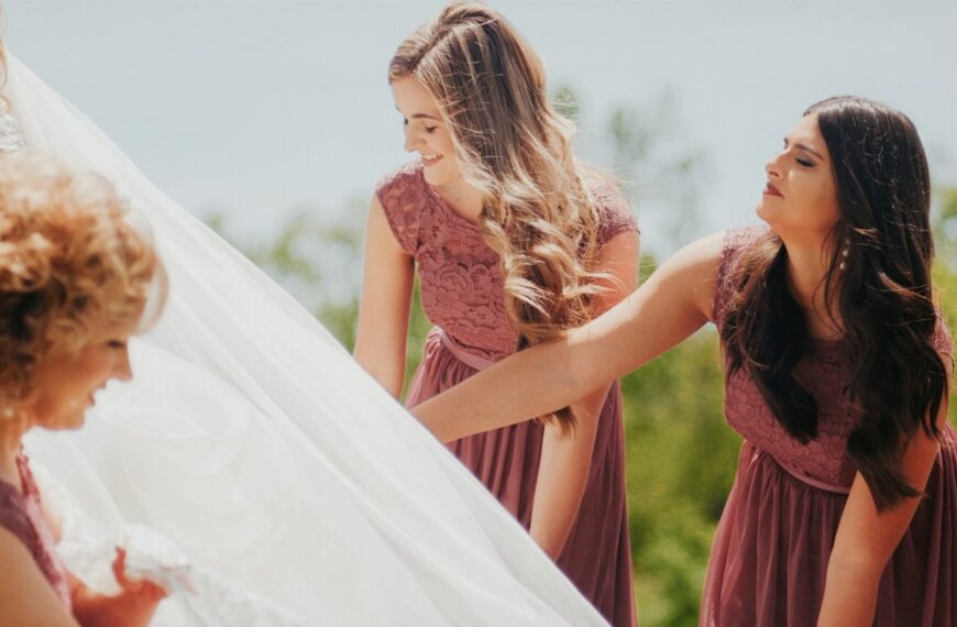a group of women standing next to each other