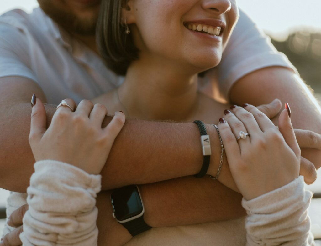 Couple embracing with a loving, happy embrace.