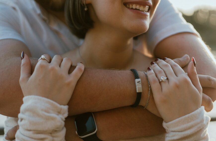 Couple embracing with a loving, happy embrace.