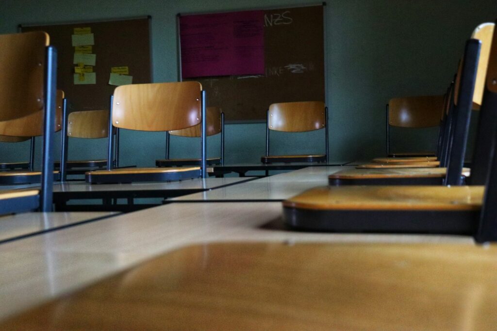 a room with chairs and a table