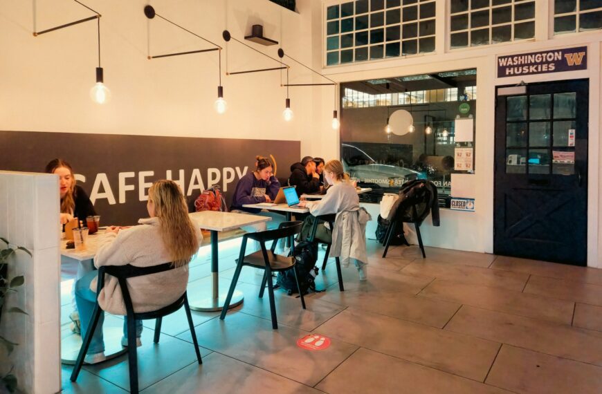 People sit and work inside a "cafe happy".