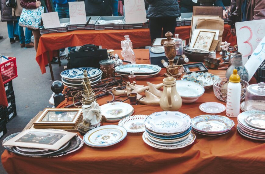 a table topped with lots of plates and bowls