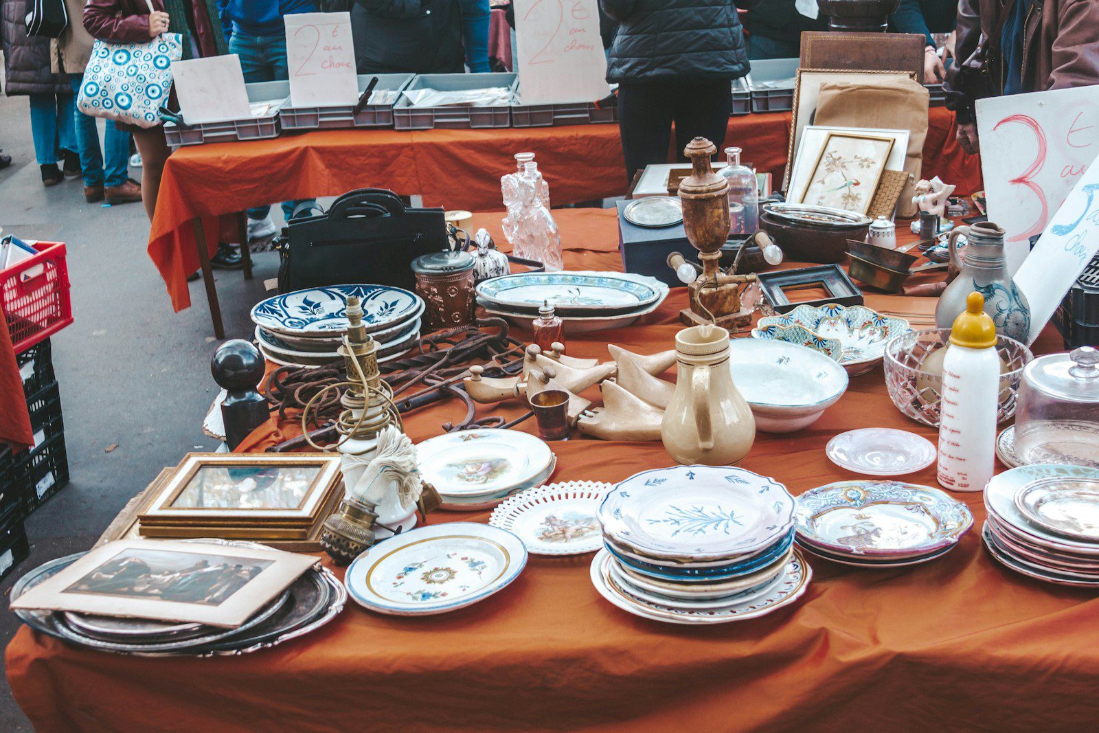 a table topped with lots of plates and bowls