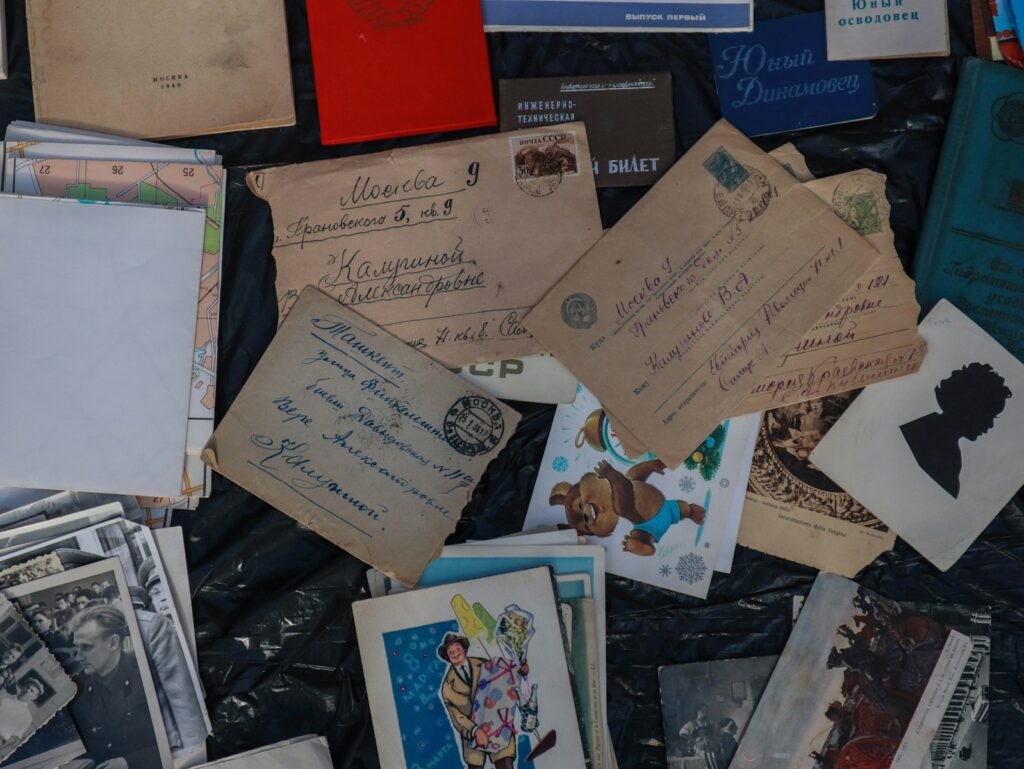 white printer paper on brown wooden table