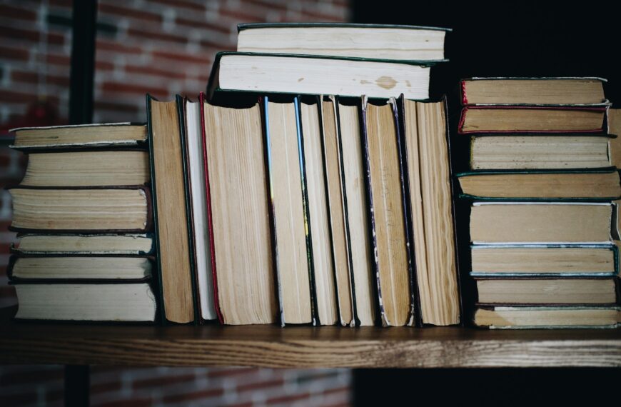 brown wooden books on brown wooden table