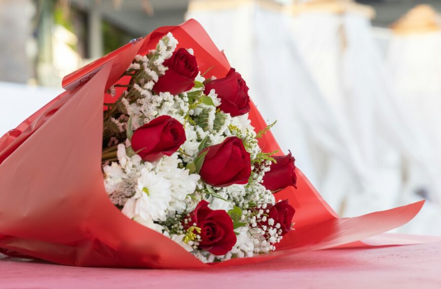 white and red flowers on red box