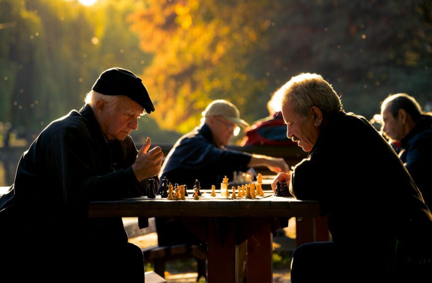 two man playing chess in shallow focus lens