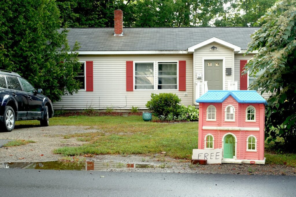 a house with a car parked in front of it