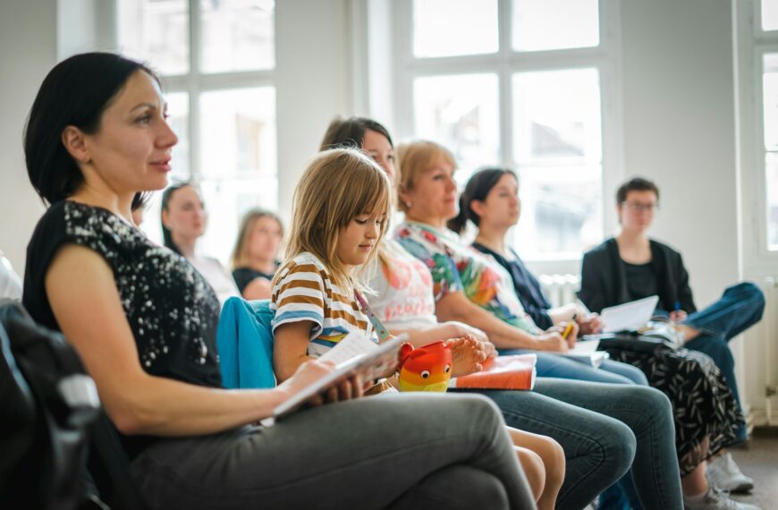 a group of people sitting in a room