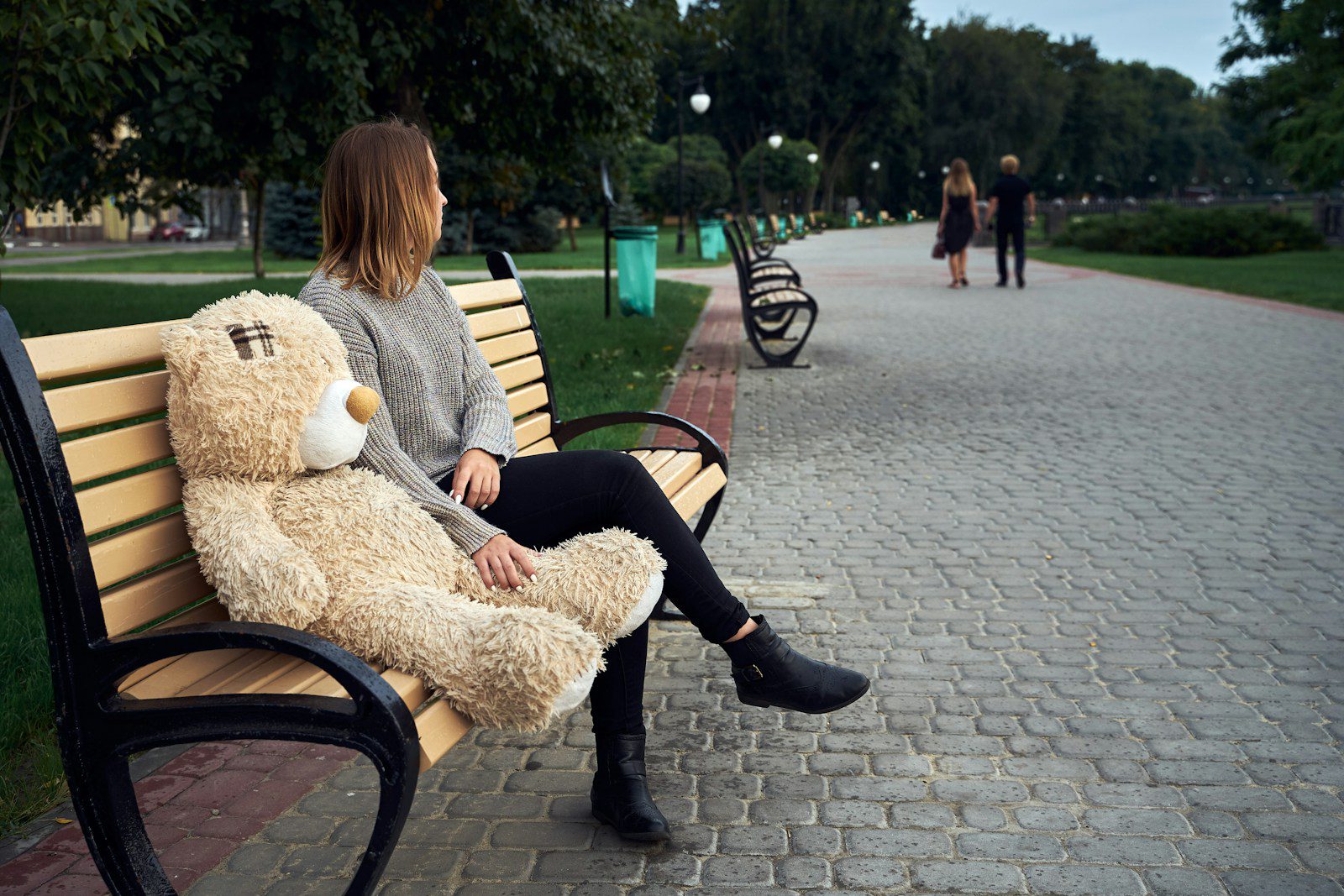 a person sitting on a bench