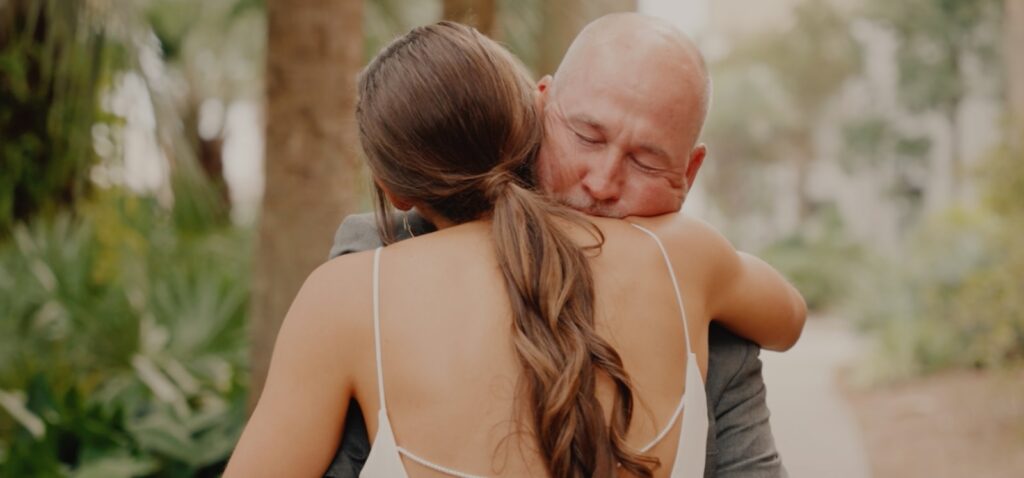 a man and a woman embracing each other