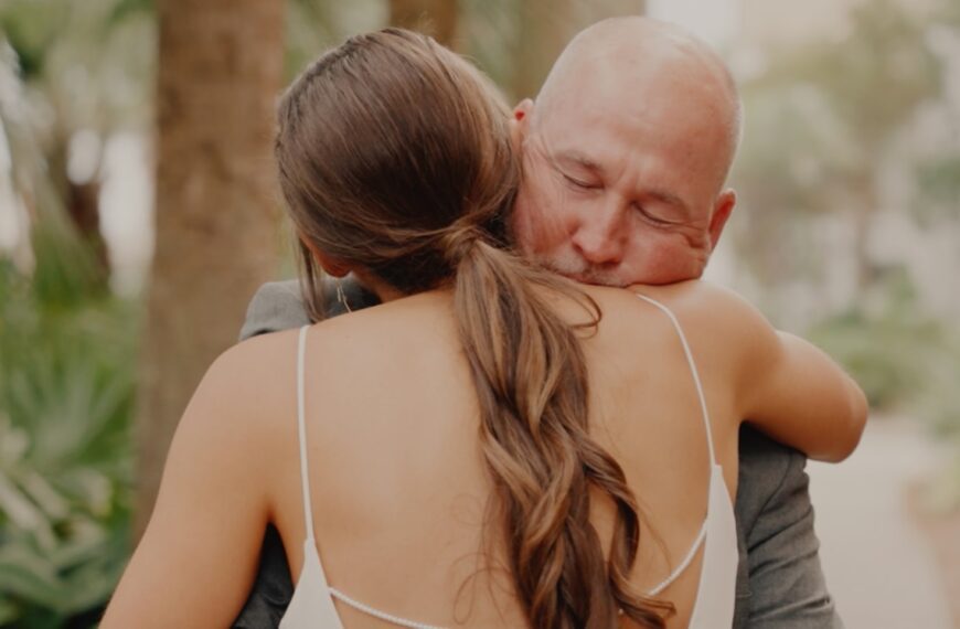 a man and a woman embracing each other