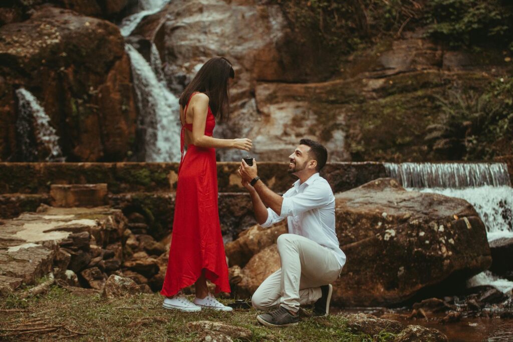 Captured blissful proposal in vibrant nature setting, perfect romantic moment.