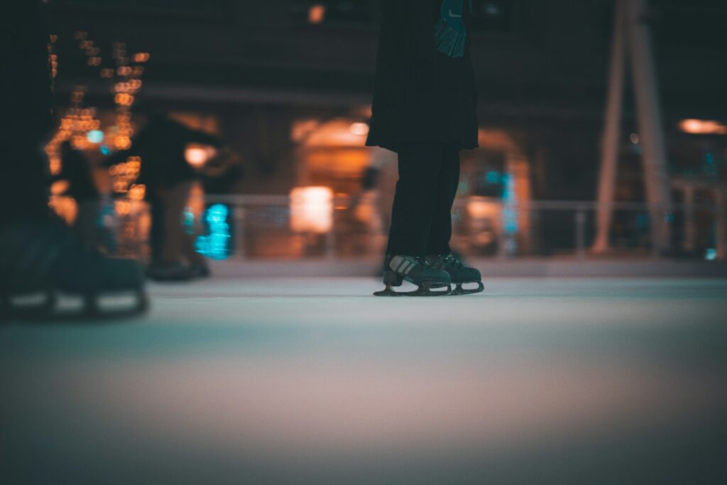 a person standing on top of a skateboard on a street