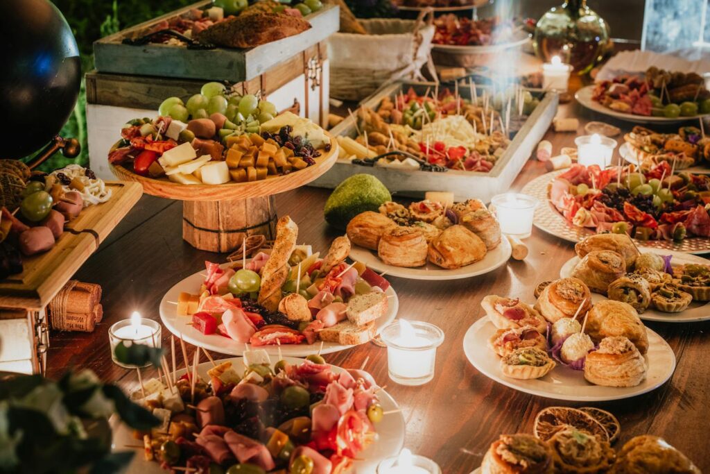 An enticing selection of gourmet food and appetizers arranged on a dining table for a festive occasion.