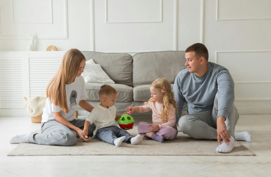 Parents and children enjoying quality time at home, playing with toys in a cozy living room setting.