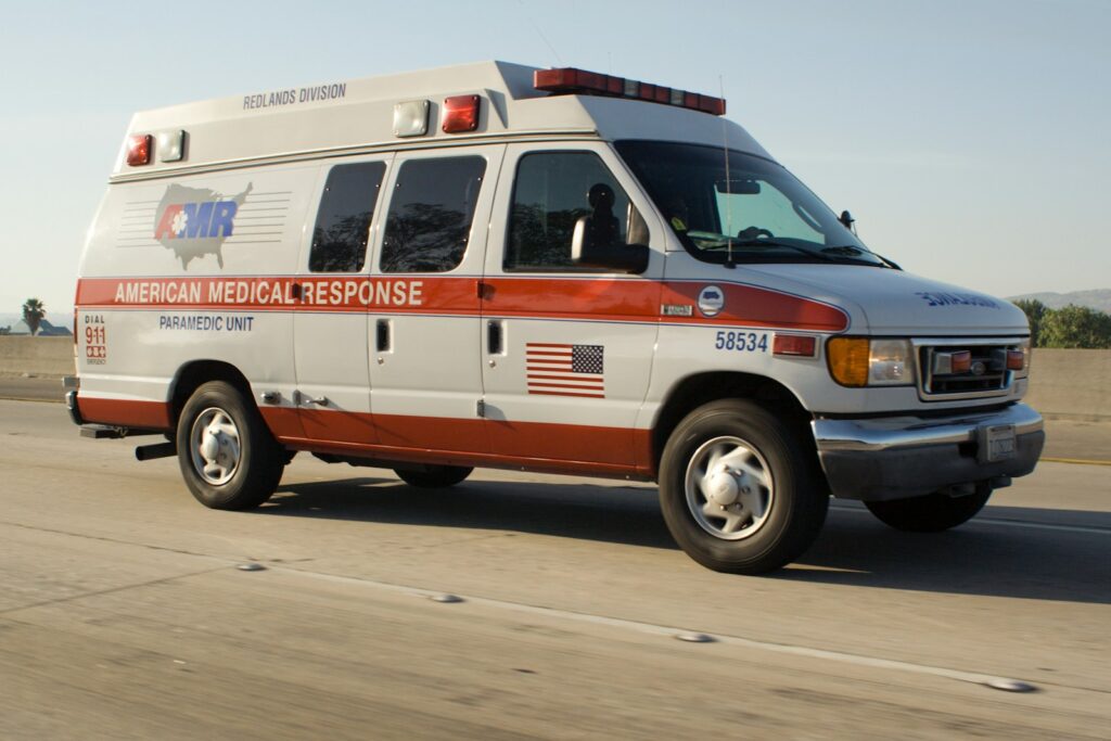 American medical response ambulance driving on highway