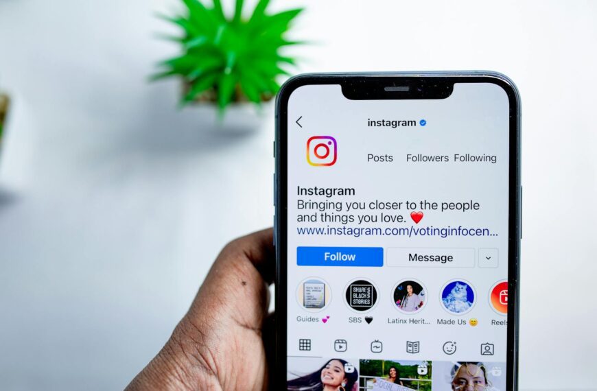 Close-up of a smartphone displaying the Instagram app, emphasizing social media connection.